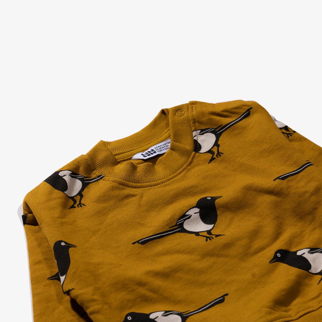 Schulteransicht des Sweatshirts für Babys aus der Birdy Kollektion