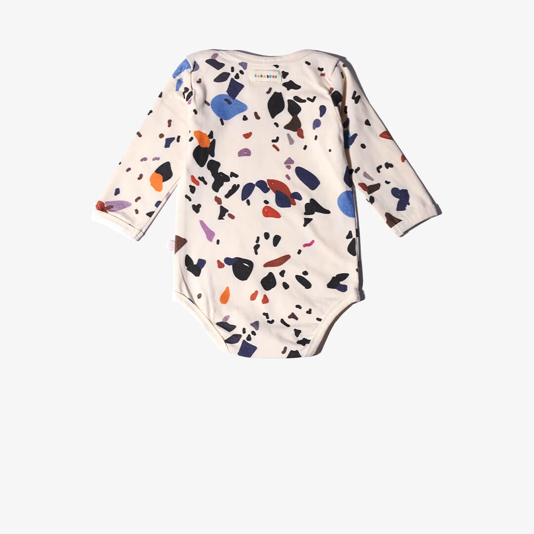 Vorderansicht des Bodys für Babys aus der DOTS Kollektion